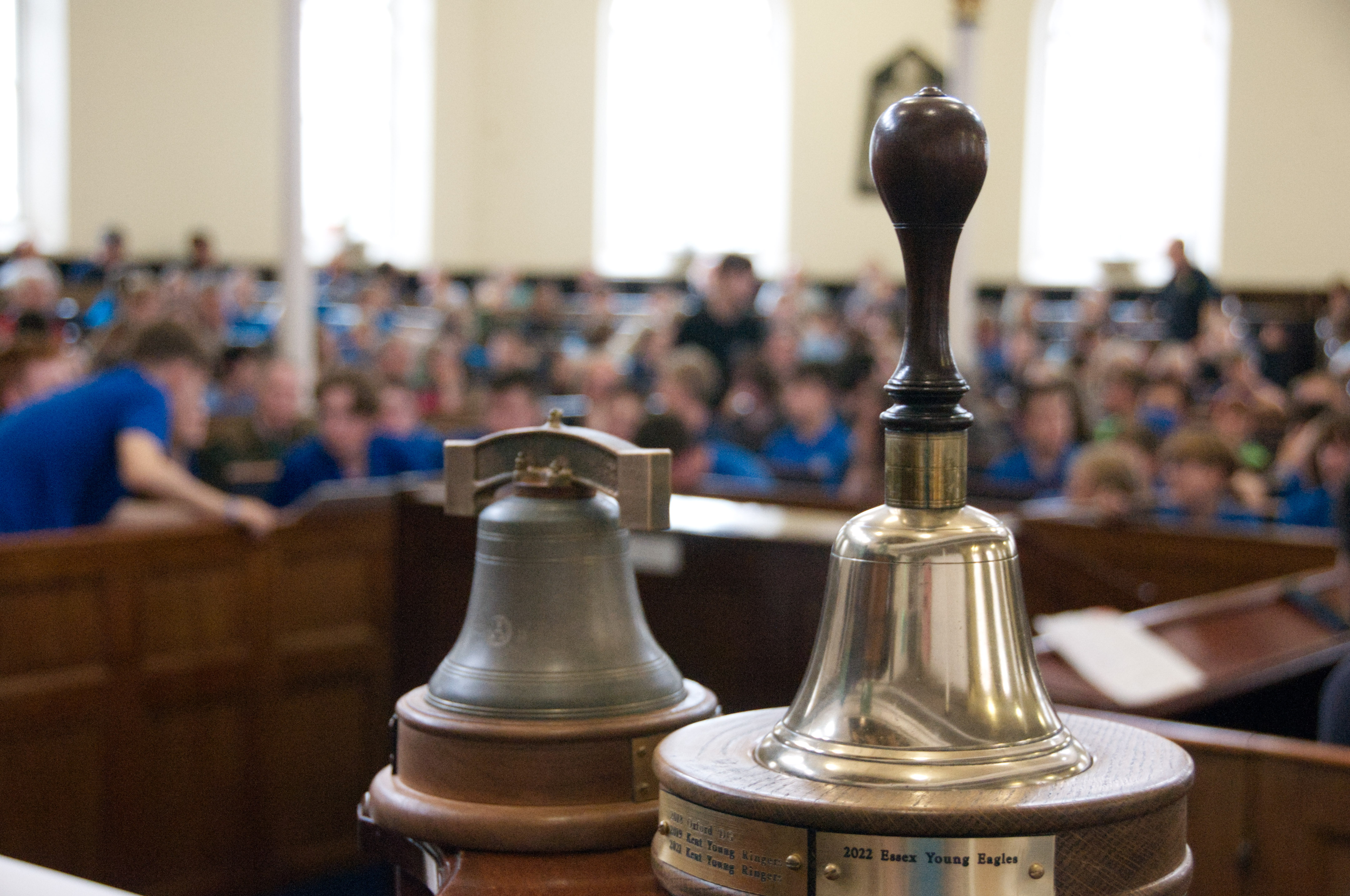 RWNYC contest trophies with young ringers in the background
